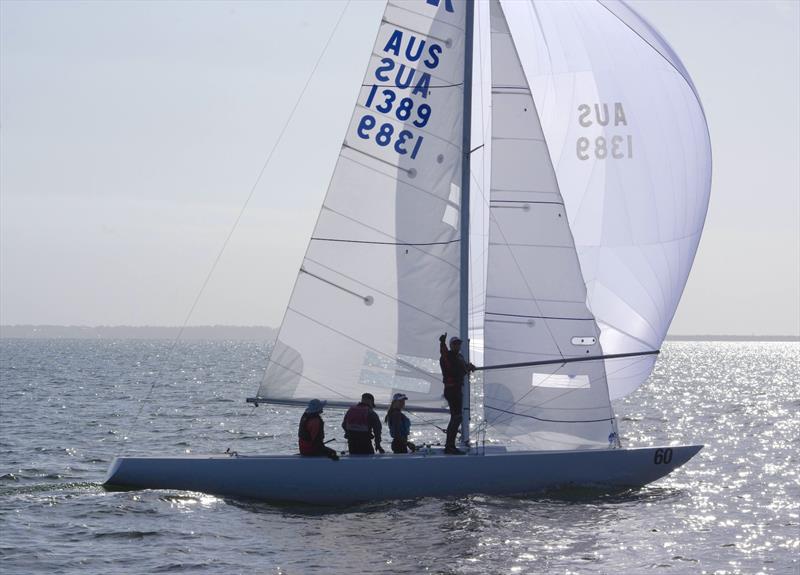 Nick Gunner and his crew Anthony McRae, Imogen Farnell and Timoth Davis, celebrate Smoking Gun AUS1389 crossing the finish line first photo copyright Jeanette Severs taken at Metung Yacht Club and featuring the Etchells class