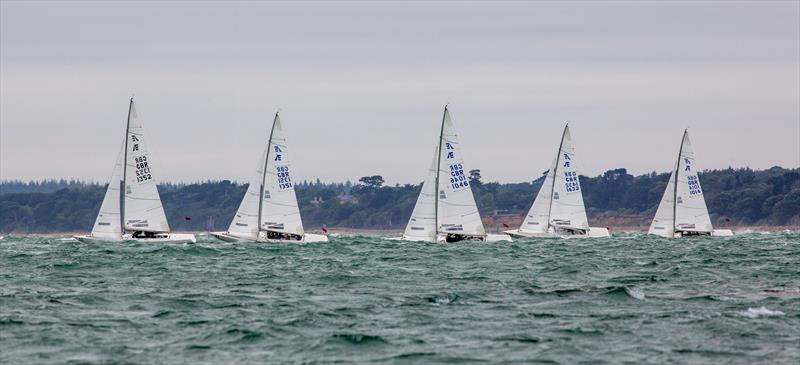 Etchells fleet on Day 2 of Cowes Week 2025 photo copyright Martin Augustus / www.sailingimages.co.uk taken at Cowes Combined Clubs and featuring the Etchells class