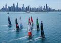 The SailGP F50 catamaran fleet sail towards the Chicago skyline and Navy Pier on Race Day 2  - T-Mobile United States Sail Grand Prix, Chicago at Navy Pier, Lake Michigan, Season 3 © Simon Bruty/SailGP