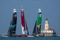 New Zealand SailGP Team, Canada SailGP Team and Australia SailGP Team sail past the Chicago Harbor Lighthouse during the final race on Race Day 2 of the Rolex United States Sail Grand Prix | Chicago © Bob Martin/SailGP