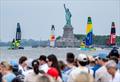 The fleet pass the Statue of Liberty - Day 2 of the Mubadala New York Sail Grand Prix  © Mike Lawrence/SailGP
