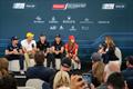 Dylan Fletcher, Giles Scott, Peter Burling, Tom Slingsby and Nicole van der Velden speak with Suzi Perry during a pre-event press conference ahead of the Emirates Great Britain Sail Grand Prix