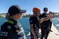 Valteri Bottas, Finish Formula 1 driver and Tiffany Cromwell, Australian Cyclist undergo their safety training in the technical area ahead of the ROCKWOOL France Sail Grand Prix held in Saint Tropez, France 