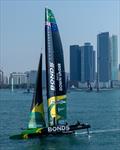 BONDS Flying Roos SailGP Team helmed by Tom Slingsby and the Abu Dhabi skyline ahead of the Mubadala Abu Dhabi Sail Grand Prix Season Grand Final presented by Abu Dhabi Sports Council held in Abu Dhabi, UAE