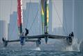 Tom Slingsby, driver of BONDS Flying Roos SailGP Team, controls the wheel of the BONDS Flying Roos SailGP F50 catamaran during a practice session ahead of the Mubadala Abu Dhabi Sail Grand Prix Season Grand Final presented by Abu Dhabi Sports Council