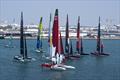 Aerial view of NORTHSTAR SailGP Team helmed by Giles Scott leading the SailGP F50 catamaran fleet, on Race Day 2 of the Mubadala Abu Dhabi Sail Grand Prix Season Grand Final presented by Abu Dhabi Sports Council