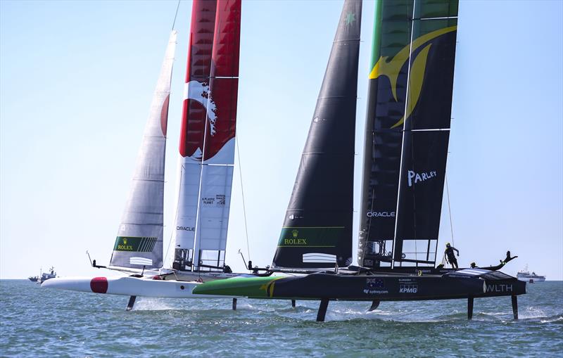 Japan SailGP Team helmed by Nathan Outterridge and Australia SailGP Team helmed by Tom Slingsby during a practice session ahead of the Spain SailGP, Event 6, Season 2 in Cadiz, Andalucia, Spain photo copyright Felix Diemer for SailGP taken at  and featuring the F50 class