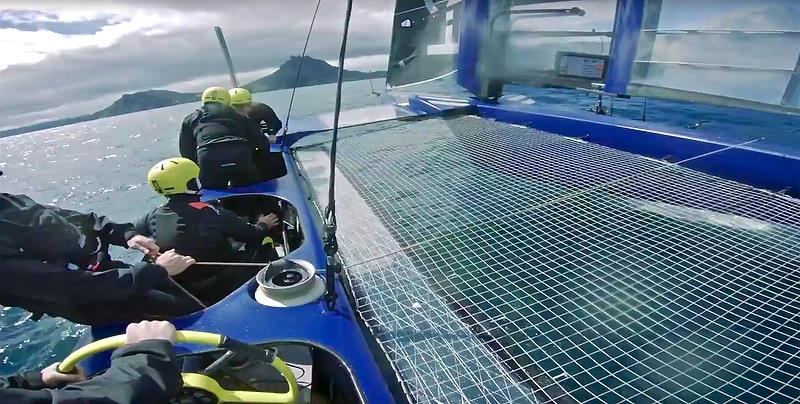 F-50 First test Sail - on board looking forward from helm - steering wheel appears to have a twist control grip, and buttons in hub; wingsail trimmer with ceramic winch; forward is flight controller with right hand on what looks to  - photo © Beau Outteridge