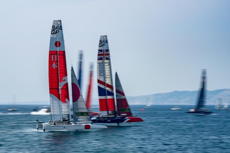 Japan SailGP Team skippered by Nathan Outteridge prepares to overtake Great Britain SailGP Team helmed by Dylan Fletcher as they compete in a practice race ahead of the final SailGP event of Season 1 in Marseille, France photo copyright Adam Warner for SailGP taken at  and featuring the F50 class