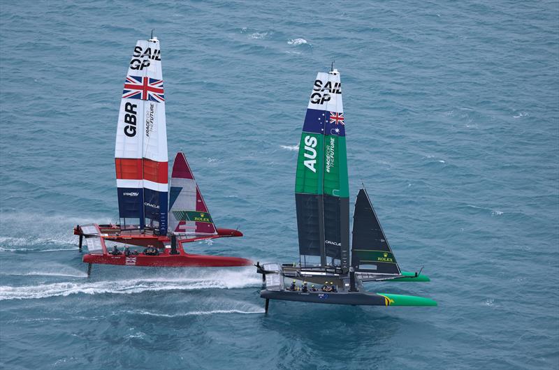 Australia SailGP Team helmed by Tom Slingsby ahead of Great Britain SailGP Team  helmed by Sir Ben Ainslie in the final race on Day 2 of Bermuda SailGP  photo copyright Bob Martin/SailGP taken at Royal Bermuda Yacht Club and featuring the F50 class