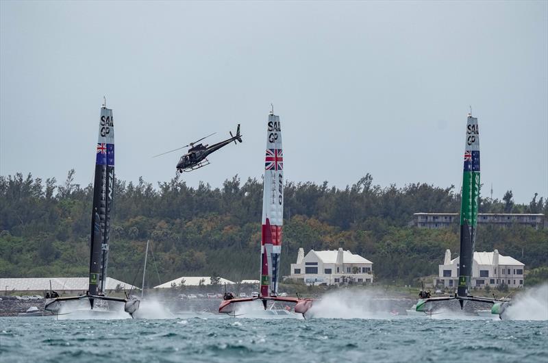 New Zealand SailGP TeamGreat Britain SailGP  and Australia SailGP Team helmed by Tom Slingsby racing in a line on Race Day 2. Bermuda SailGP  - photo © Bob Martin/SailGP