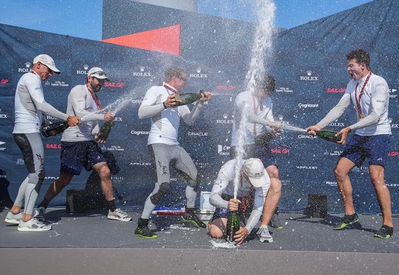 Japan SailGP Team helmed by Nathan Outterridge spray Champagne Barons de Rothschildon on the podium after winning Saint-Tropez SailGP on Race Day 2 photo copyright Bob Martin for SailGP taken at  and featuring the F50 class