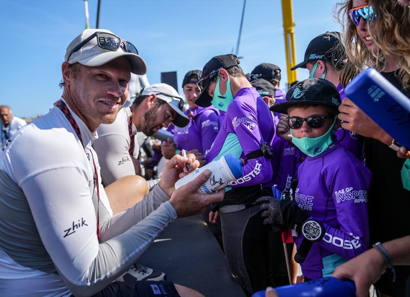 Nathan Outteridge, CEO & helmsman of Japan SailGP Team, signs autographs for the young sailors in the SailGP Inspire program after winning the final race on Race Day 2 of France SailGP - photo © Bob Martin for SailGP