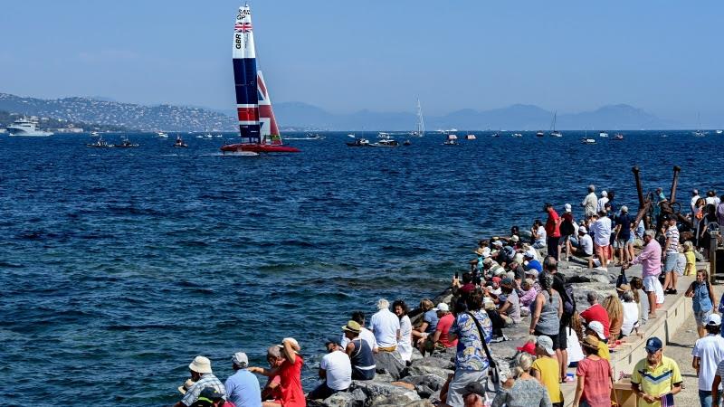 Great Britain SailGP Team helmed by Ben Ainslie sail past spectators on the shore line on Race Day 2 photo copyright Jon Buckle for SailGP taken at  and featuring the F50 class