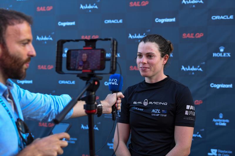 Erica Dawson of New Zealand SailGP Team speaks to the media in the Technical Area after Race Day 1 at Spain SailGP photo copyright Ricardo Pinto/SailGP taken at  and featuring the F50 class