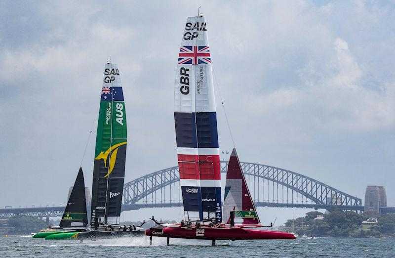 Australia SailGP Team helmed by Tom Slingsby and Great Britain SailGP Team helmed by Ben Ainslie sail past the Sydney Harbour Bridge during a practice race ahead of the Australia Sail Grand Prix presented by KPMG photo copyright Bob Martin for SailGP taken at  and featuring the F50 class