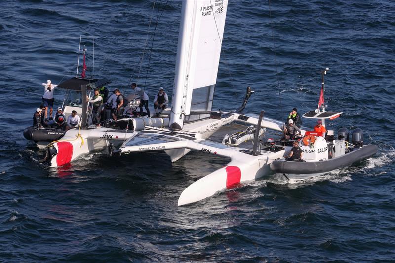 Support Boats work with Japan SailGP Team F50 catamaran after it sustained damage after a collision with Great Britain SailGP Team on Race Day 1.  - photo © David Gray/SailGP