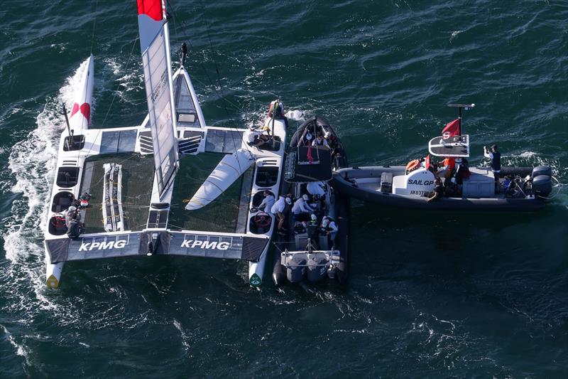 Support Boats work with Japan SailGP Team F50 catamaran after it sustained damage after a collision with Great Britain SailGP Team on Race Day 1.  - photo © David Gray/SailGP
