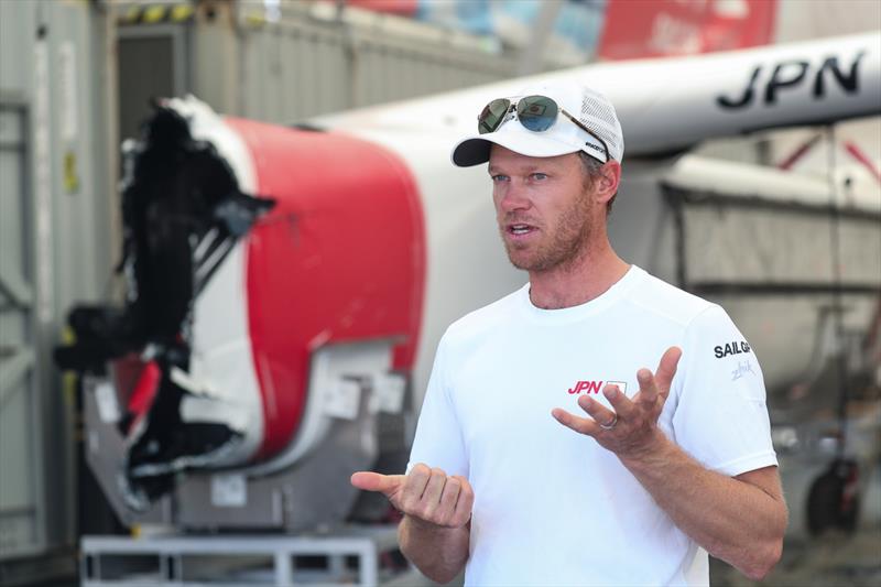 Nathan Outteridge, CEO & driver of Japan SailGP Team, stands next to the F50 catamaran that sustained damage in a collision with Great Britain SailGP Team during previous days racing.  - photo © Brett Costello/SailGP