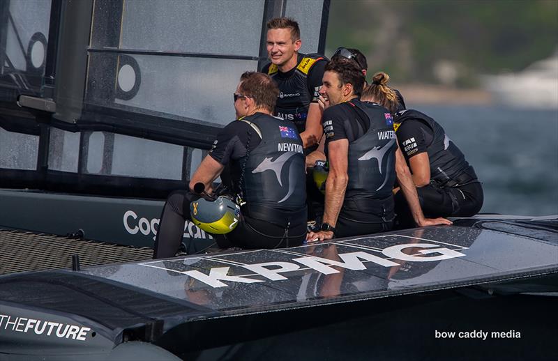 A happy Australian crew awaits the onboard presentation photo copyright Bow Caddy Media taken at  and featuring the F50 class