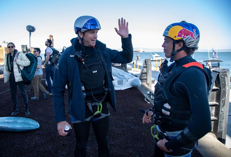 Red Bull surfers Jamie O'Brien and Kai Lenny chat after joining the USA SailGP Team as a sixth sailor for the day for a practice session ahead of San Francisco SailGP, Season 2 in San Francisco, USA. 21st March photo copyright Jed Jacobsohn for SailGP taken at San Francisco Yacht Club and featuring the F50 class