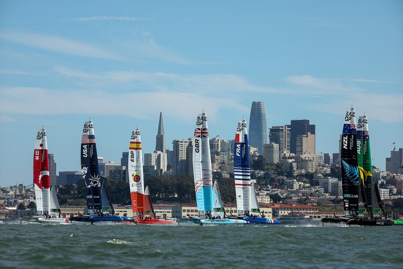 The F50 catamaran fleet foiling with the city in the background on Race Day 1 of San Francisco SailGP, Season 2 photo copyright Simon Bruty for SailGP taken at  and featuring the F50 class