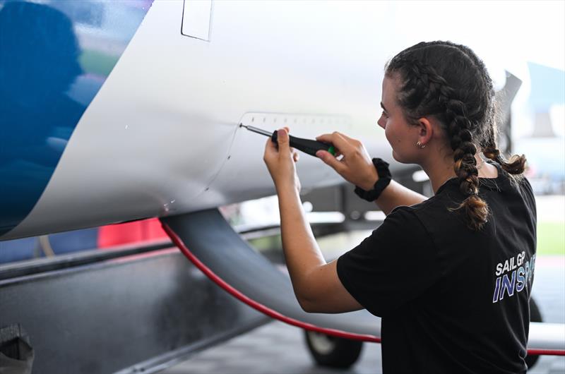 A SailGP Inspire Careers candidate helps prepare the Canada SailGP Team F50 catamaran at the Technical Base ahead of Bermuda SailGP  Season 3 in Bermuda.May 2022 photo copyright Ricardo Pinto/SailGP taken at Royal Bermuda Yacht Club and featuring the F50 class