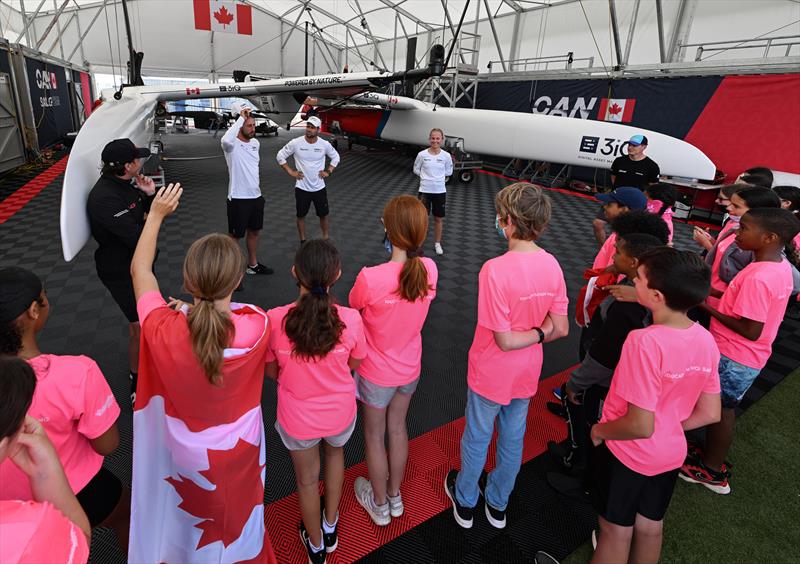 Guests of Endeavour, a Bermuda-registered charity that engages Bermuda's youth in experiential learning through sailing, speak with the Canada SailGP Team during a tour of the Technical Base ahead of Bermuda SailGP Season 3 in Bermuda. May 2022 - photo © Ricardo Pinto/SailGP
