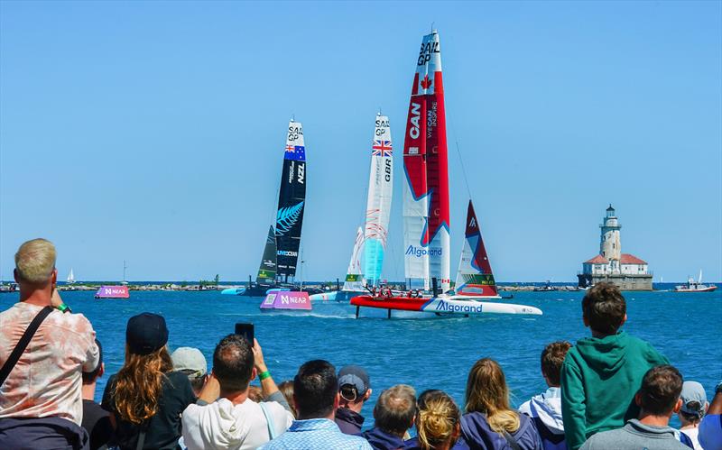 Spectators in the Fan Zone watch as the Canada SailGP Team race past on Race Day 1 of the T-Mobile United States Sail Grand Prix | Chicago at Navy Pier, Lake Michigan, Season 3 photo copyright Kevin Tanaka for SailGP taken at  and featuring the F50 class