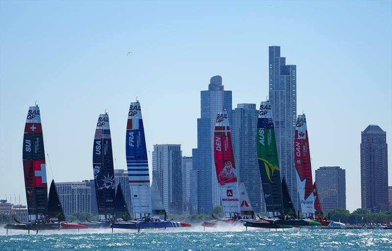 The fleet sail past the Chicago skyline on Race Day 1 of the T-Mobile United States Sail Grand Prix | Chicago at Navy Pier, Lake Michigan, Season 3, in Chicago, Illinois, USA.June 2022 - photo © Chloe Knott/SailGP