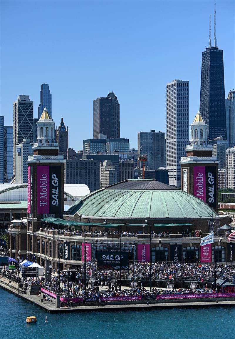 Spectators gather on the Navy Pier with the Chicago skyline in the distance on Race Day 1 of the T-Mobile United States Sail Grand Prix | Chicago at Navy Pier photo copyright Jon Buckle for SailGP taken at  and featuring the F50 class