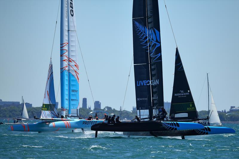 New Zealand SailGP Team co-helmed by Peter Burling and Blair Tuke and Great Britain SailGP team helmed by Ben Ainslie, in action on Race Day 1 of the T-Mobile United States Sail Grand Prix, June 2022 - photo © Ricardo Pinto/SailGP