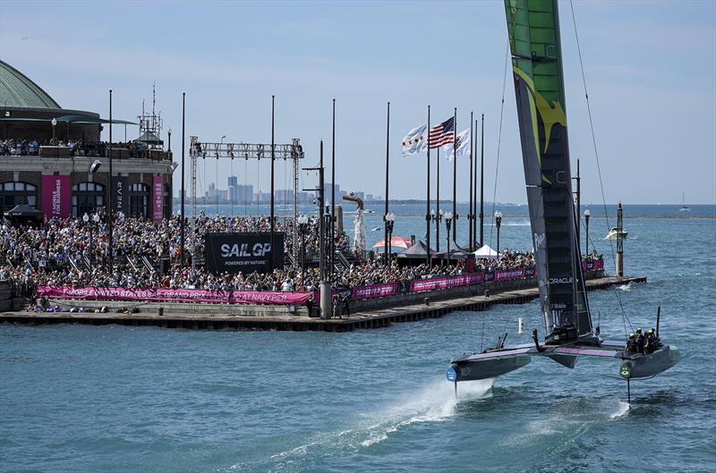 Australia SailGP Team helmed by Tom Slingsby celebrate winning by sailing by spectators on Navy Pier on Race Day 2 of the T-Mobile United States Sail Grand Prix | Chicago at Navy Pier, Lake Michigan, Season 3, in Chicago, Illinois, USA. 19th June 2022. photo copyright Simon Bruty for SailGP taken at Chicago Yacht Club and featuring the F50 class