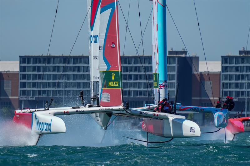 Canada SailGP Team helmed by Phil Robertson and Great Britain SailGP Team helmed by Ben Ainslie in action T-Mobile United States Sail Grand Prix, Chicago at Navy Pier, Lake Michigan, Season 3 photo copyright Bob Martin/SailGP taken at Chicago Yacht Club and featuring the F50 class