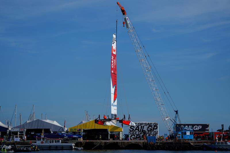 Canada SailGP Team F50 catamaran being craned into the the Technical Base after a practice session ahead of the Great Britain Sail Grand Prix | Plymouth in Plymouth, England. 29th July 2022 - photo © Ricardo Pinto/SailGP