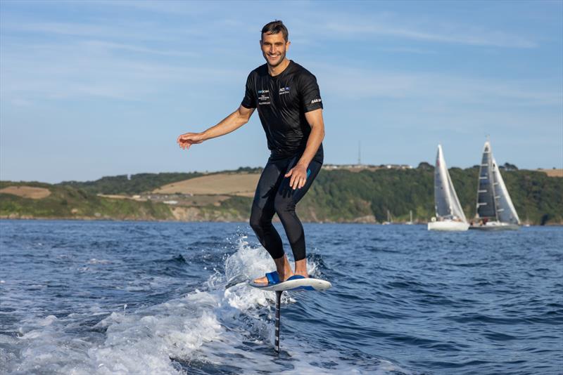 Blair Tuke, Co-CEO and wing trimmer of New Zealand SailGP Team tries out wakeboarding with young sailors in the SailGP Inspire program, following a practice session ahead of the Great Britain Sail Grand Prix | Plymouth in Plymouth, England. 29th July 2022 photo copyright Felix Diemer/SailGP taken at Royal Plymouth Corinthian Yacht Club and featuring the F50 class