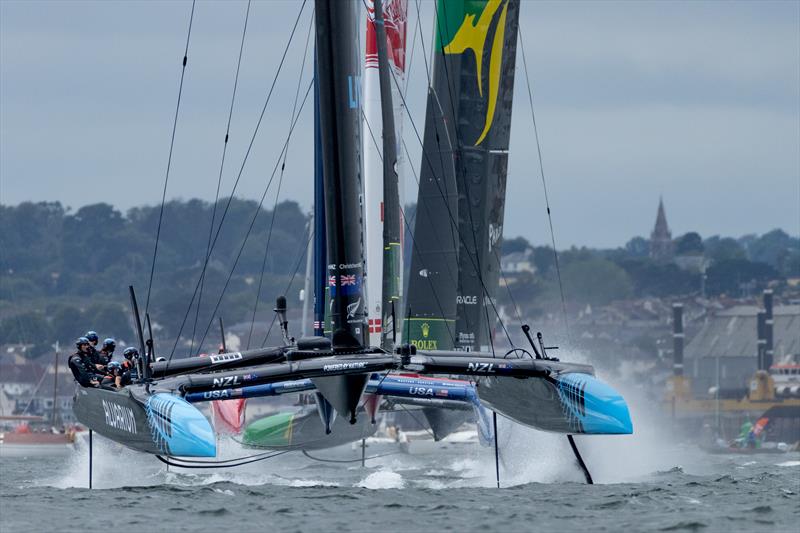 New Zealand SailGP Team and Australia SailGP Team  in action on Race Day 1 of the Great Britain Sail Grand Prix | Plymouth in Plymouth, England. 30th July , 2022 photo copyright Felix Diemer/SailGP taken at Royal Plymouth Corinthian Yacht Club and featuring the F50 class
