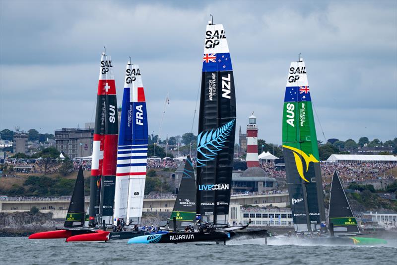 Switzerland SailGP Team Australia SailGP Team, France SailGP Team helmed  and New Zealand SailGP Team  in action on Race Day 1 of the Great Britain Sail Grand Prix | Plymouth in Plymouth, England. 30th July 2022 - photo © Bob Martin/SailGP