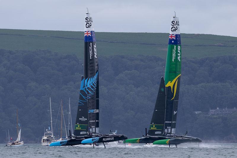 New Zealand SailGP Team co-helmed by Peter Burling and Blair Tuke battle with Australia SailGP Team helmed by Tom Slingsby on Race Day 2 of the Great Britain Sail Grand Prix | Plymouth - photo © David Gray for SailGP
