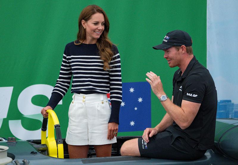 HRH The Duchess of Cambridge stands in the cockpit of the Australia SailGP Team F50 catamaran as she speaks with Tom Slingsby, CEO and driver of Australia SailGP Team, during a tour of the Technical Base at the Great Britain Sail Grand Prix | Plymouth photo copyright Bob Martin for SailGP taken at  and featuring the F50 class