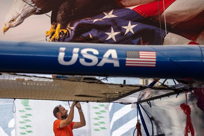 A member of the SailGP Technical team prepares the USA SailGP Team F50 catamaran at the Technical Base ahead of the ROCKWOOL Denmark Sail Grand Prix in Copenhagen, Denmark - photo © David Gray for SailGP