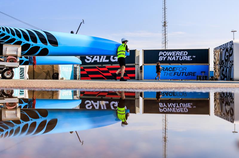 A member of the New Zealand SailGP Shore Team rolls out the New Zealand SailGP Team F50 catamaran for a training session ahead of the Rockwool Denmark Sail Grand Prix in Copenhagen, Denmark. 18th August photo copyright Felix Diemer / SailGP taken at Royal New Zealand Yacht Squadron and featuring the F50 class