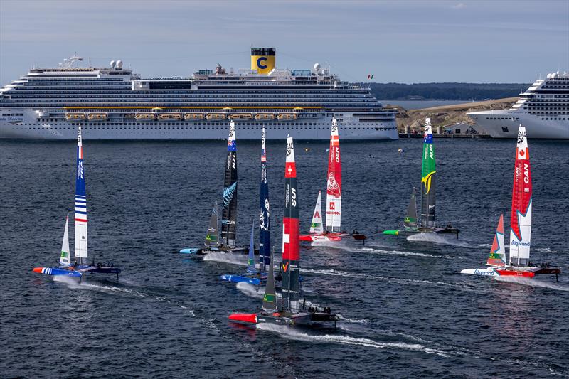 The SailGP fleet in action in front of the Costa Diadema cruise ship on Race Day 2 of the Rockwool Denmark Sail Grand Prix in Copenhagen, Denmark. 20th August  photo copyright David Gray/SailGP taken at Royal Danish Yacht Club and featuring the F50 class