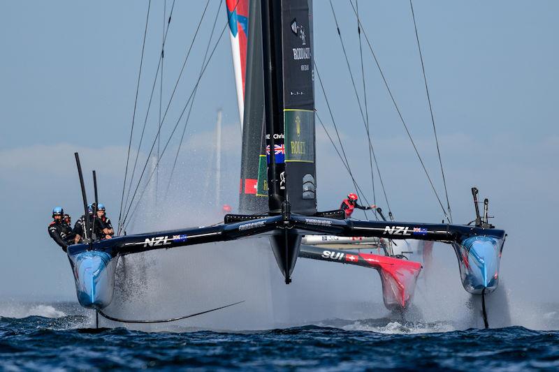 The New Zealand SailGP Team helmed by Peter Burling and Switzerland SailGP Team helmed by Nathan Outteridge in action on Race Day 2 of the ROCKWOOL Denmark Sail Grand Prix in Copenhagen, Denmark - photo © Ricardo Pinto for SailGP