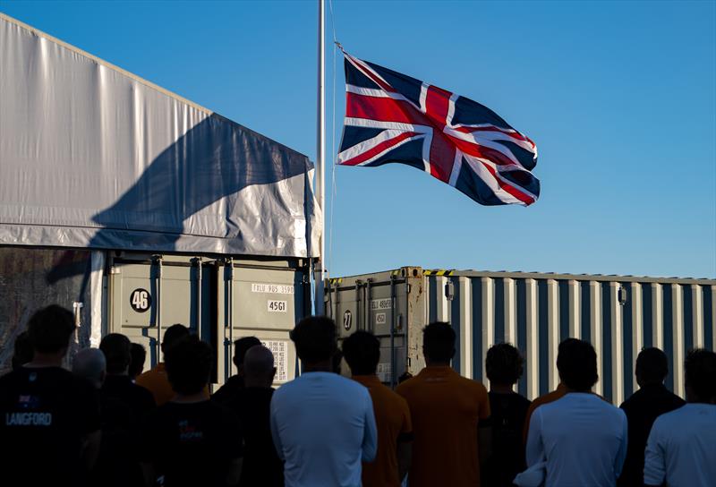 The Great Britain SailGP Team, Australia SailGP Team, New Zealand SailGP Team and Canada SailGP Team gather as the Union Jack is lowered to half-mast at the  British base photo copyright Ricardo Pinto/SailGP taken at Société Nautique de Saint-Tropez and featuring the F50 class