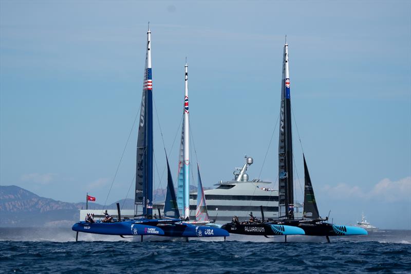 USA SailGP Team , New Zealand SailGP Team and Great Britain SailGP Team  sail past the superyacht Savannah on Race Day 1 of the Range Rover France Sail Grand Prix in Saint Tropez, France photo copyright Bob Martin/SailGP taken at Société Nautique de Saint-Tropez and featuring the F50 class