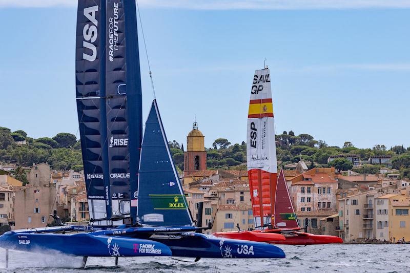 USA SailGP Team helmed by Jimmy Spithill and Spain SailGP Team helmed by Jordi Xammar sail past the Bell Tower of Saint Tropez on Race Day 1 of the Range Rover France Sail Grand Prix in Saint Tropez, France photo copyright David Gray for SailGP taken at  and featuring the F50 class