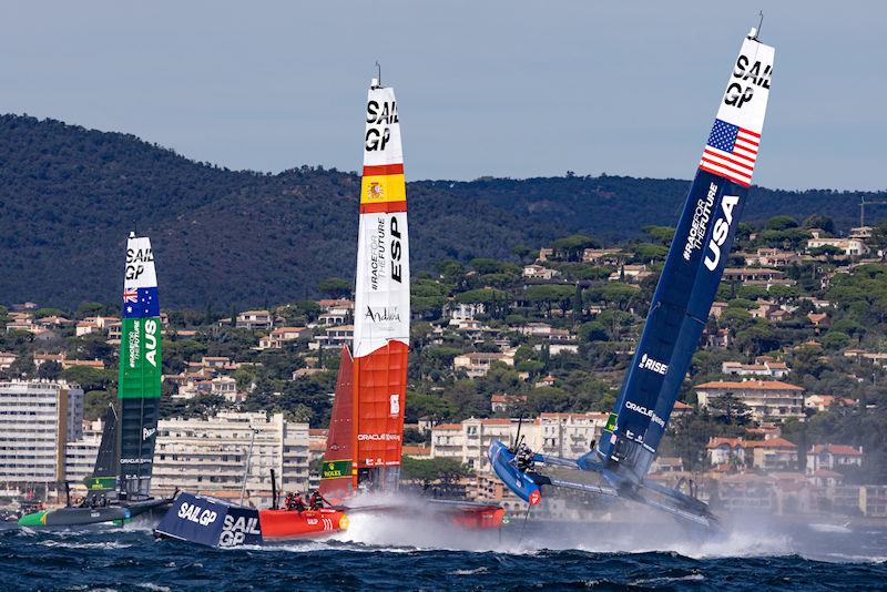 The F50 catamaran of USA SailGP Team helmed by Jimmy Spithill goes airborne close to Spain SailGP Team helmed by Jordi Xammar and Australia SailGP Team helmed by Tom Slingsby on Race Day 1 of the Range Rover France Sail Grand Prix in Saint Tropez, France photo copyright David Gray for SailGP taken at  and featuring the F50 class