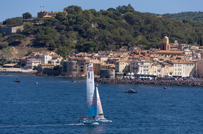 Great Britain SailGP Team helmed by Ben Ainslie sail past the Old Town and Bell Tower of Saint Tropez on Race Day 2 of the Range Rover France Sail Grand Prix in Saint Tropez, France - photo © David Gray for SailGP
