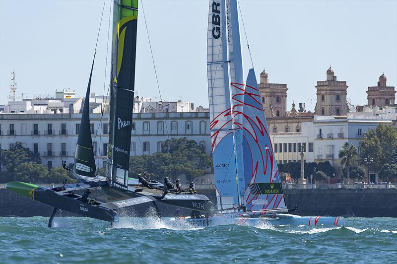 Australia SailGP Team helmed by Tom Slingsby and Great Britain SailGP Team helmed by Ben Ainslie in action on Race Day 1 of the Spain Sail Grand Prix in Cadiz, Andalusia, Spain. 24th September - photo © Ian Walton for SailGP